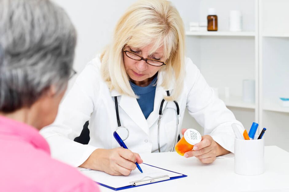 Doctor prescribing medication for pain in the hip joint. 